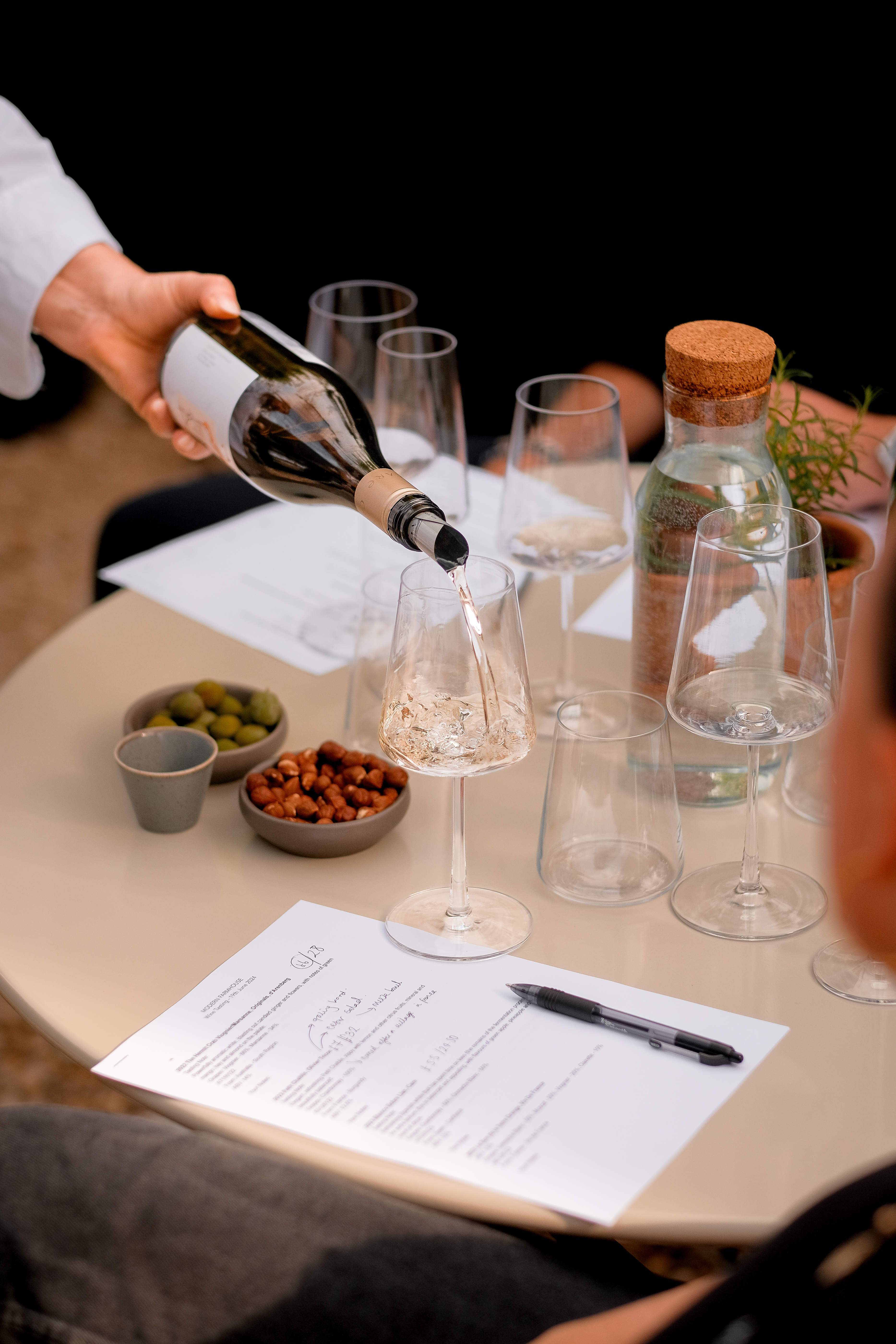pouring wine for tasting