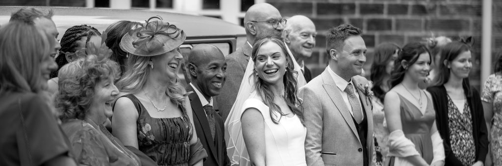 Family and friends wedding group photo