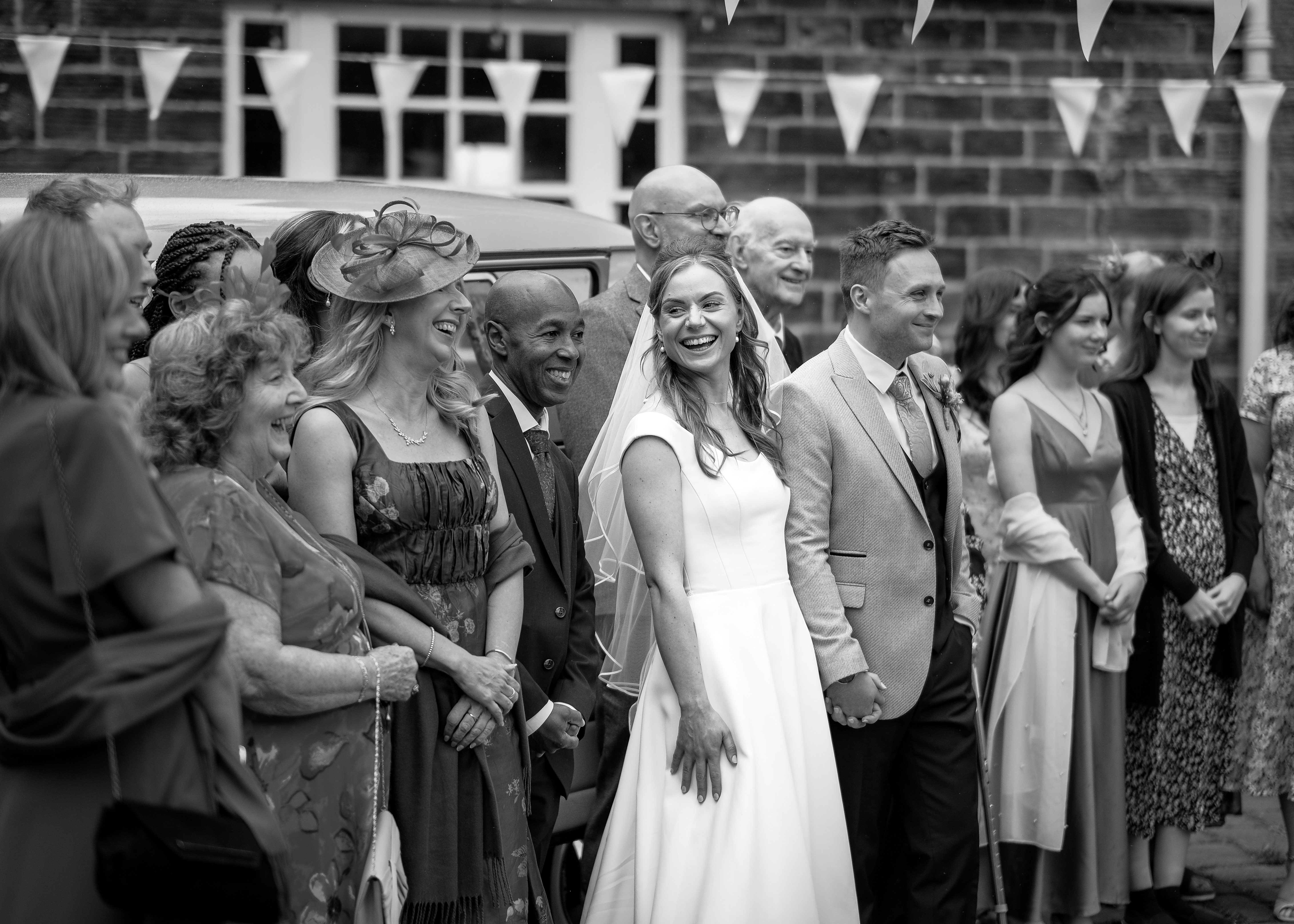 Family and friends wedding group photo