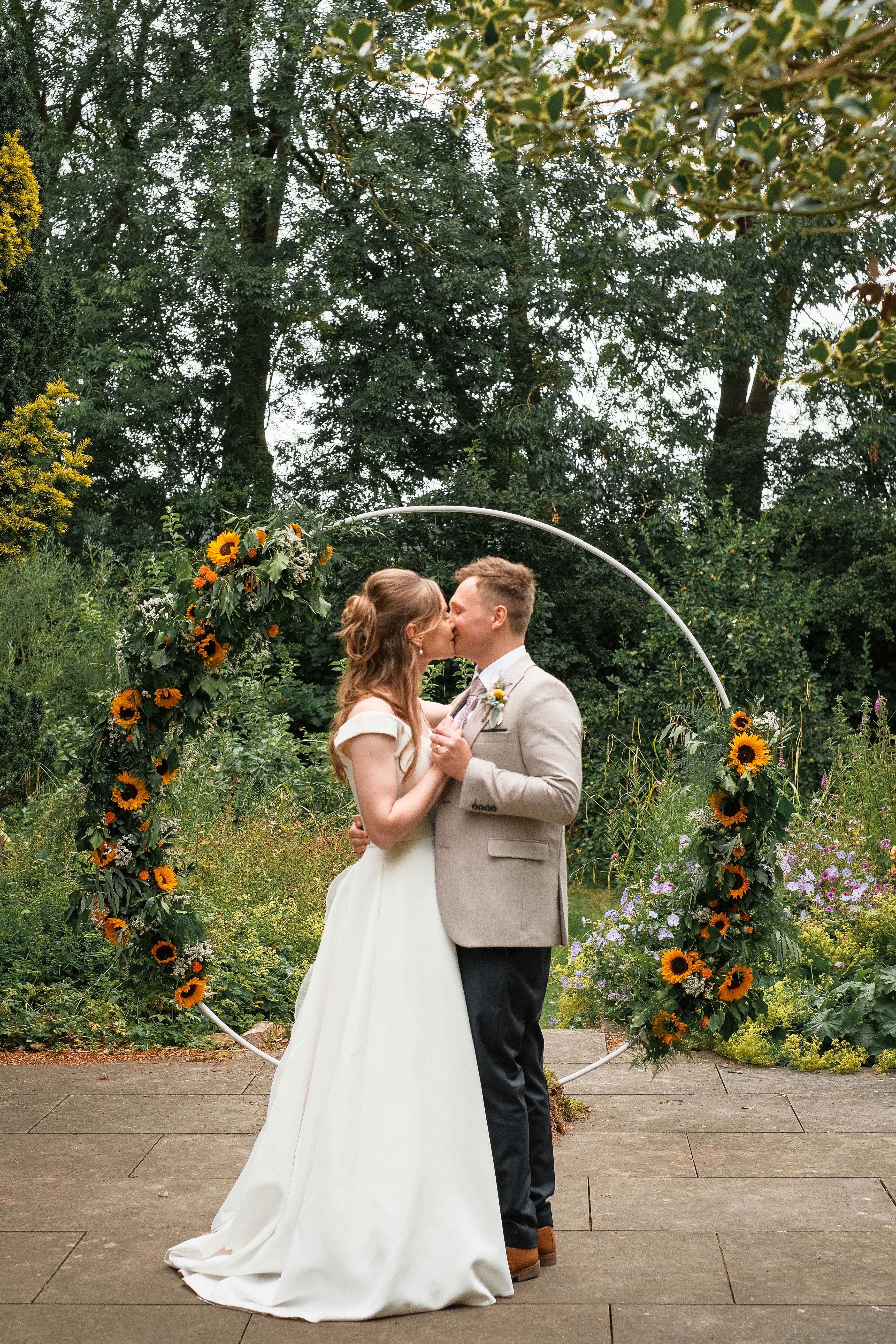 bride and groom kiss