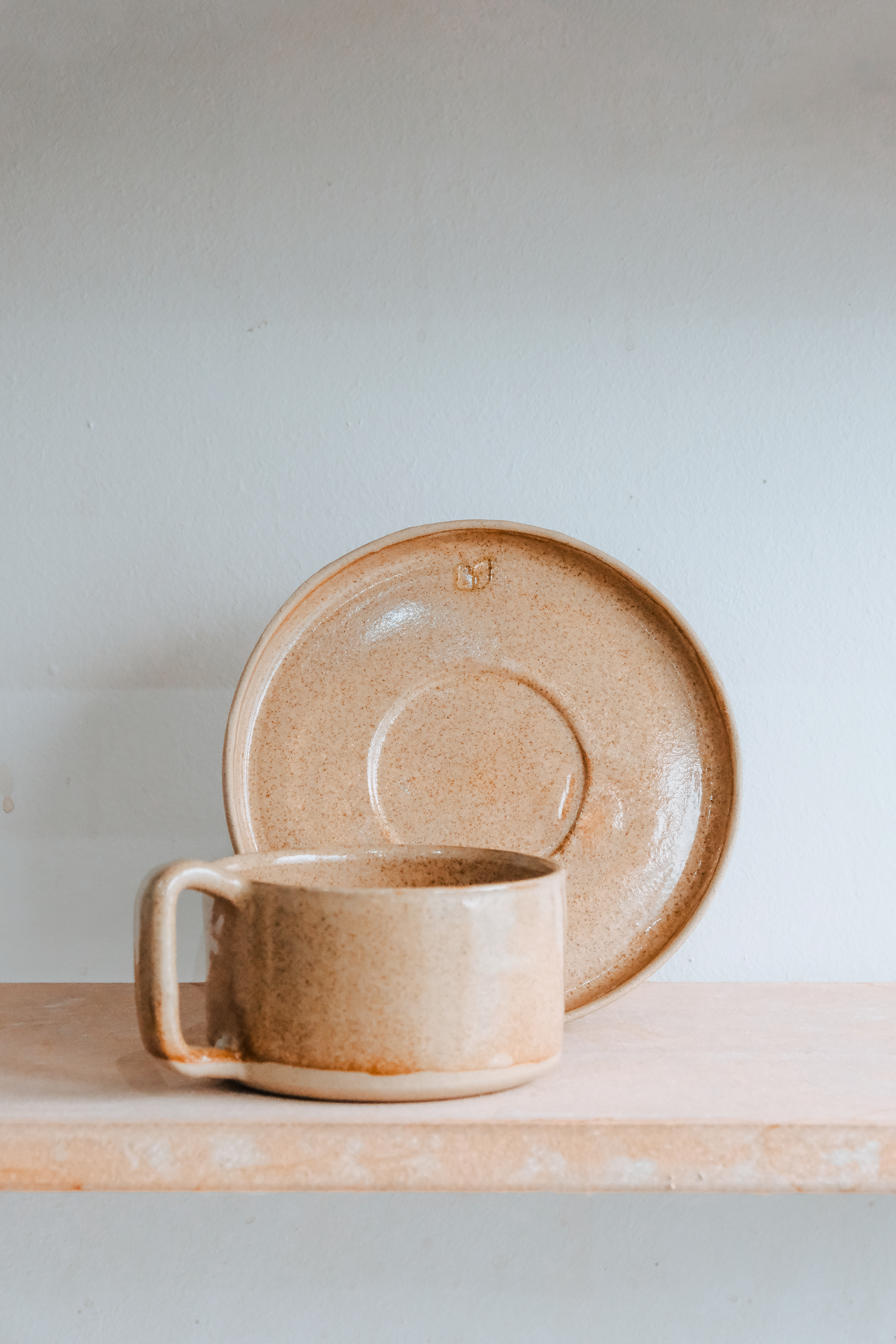 product photo of ceramic cup and plate